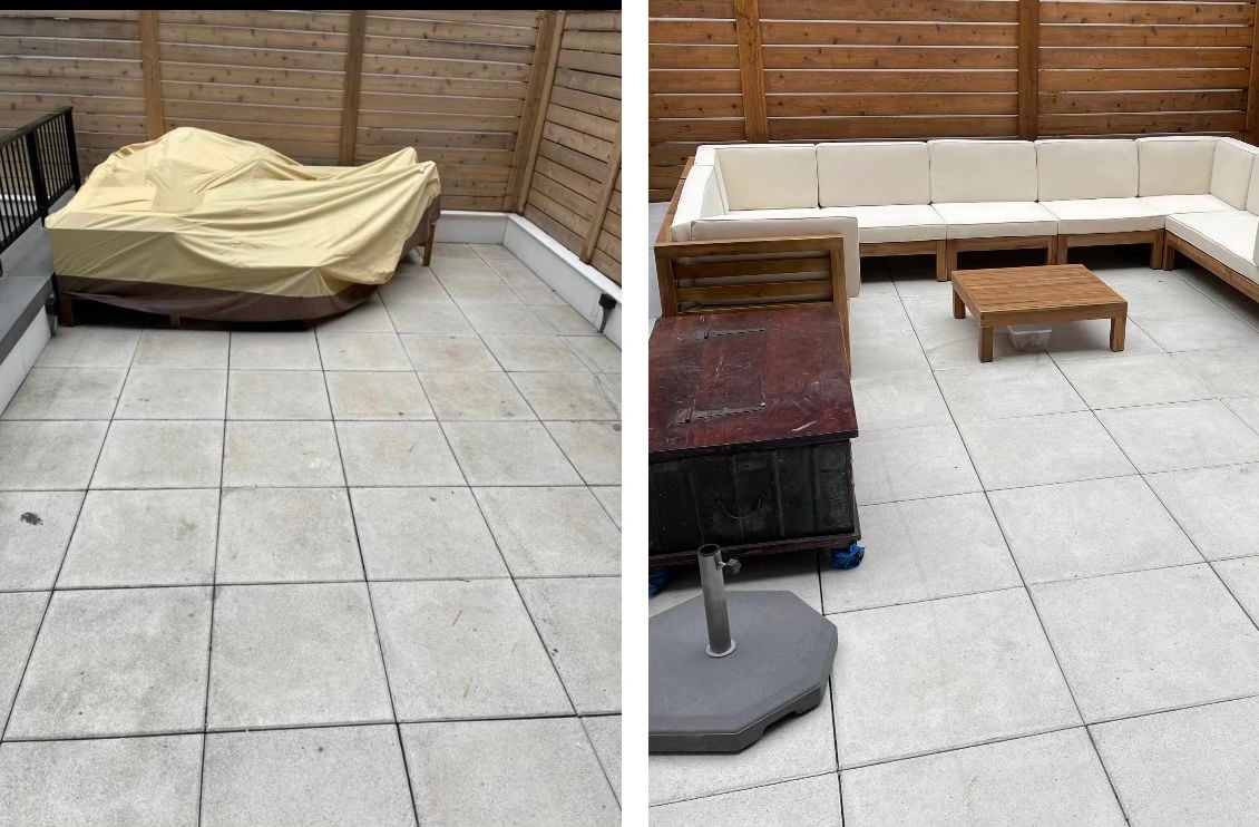 Power washing a brick driveway